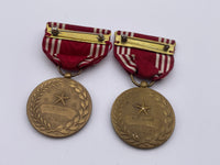 Pair, Original World War Two Era American Good Conduct Medal, Named to M E Lloyd
