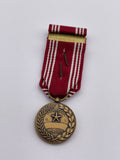 Original World War Two Era American Good Conduct Miniature Medal, 4 Awards Clasp